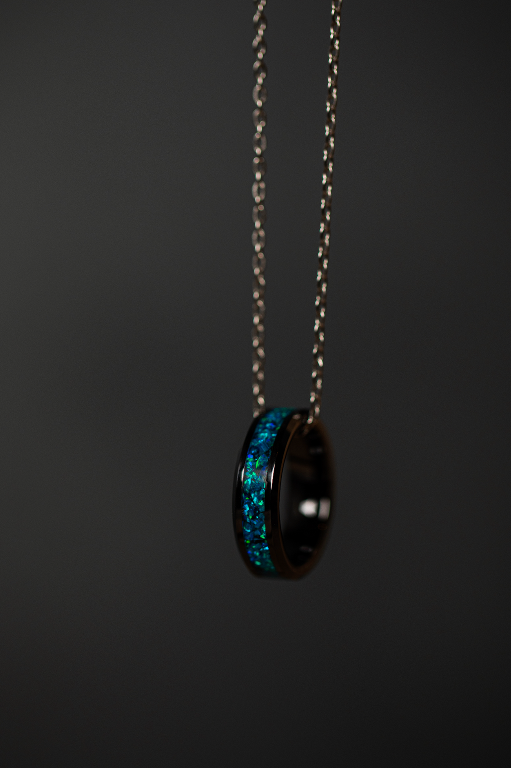 Ocean Blue Opal on Black Ceramic Keepsake Ring